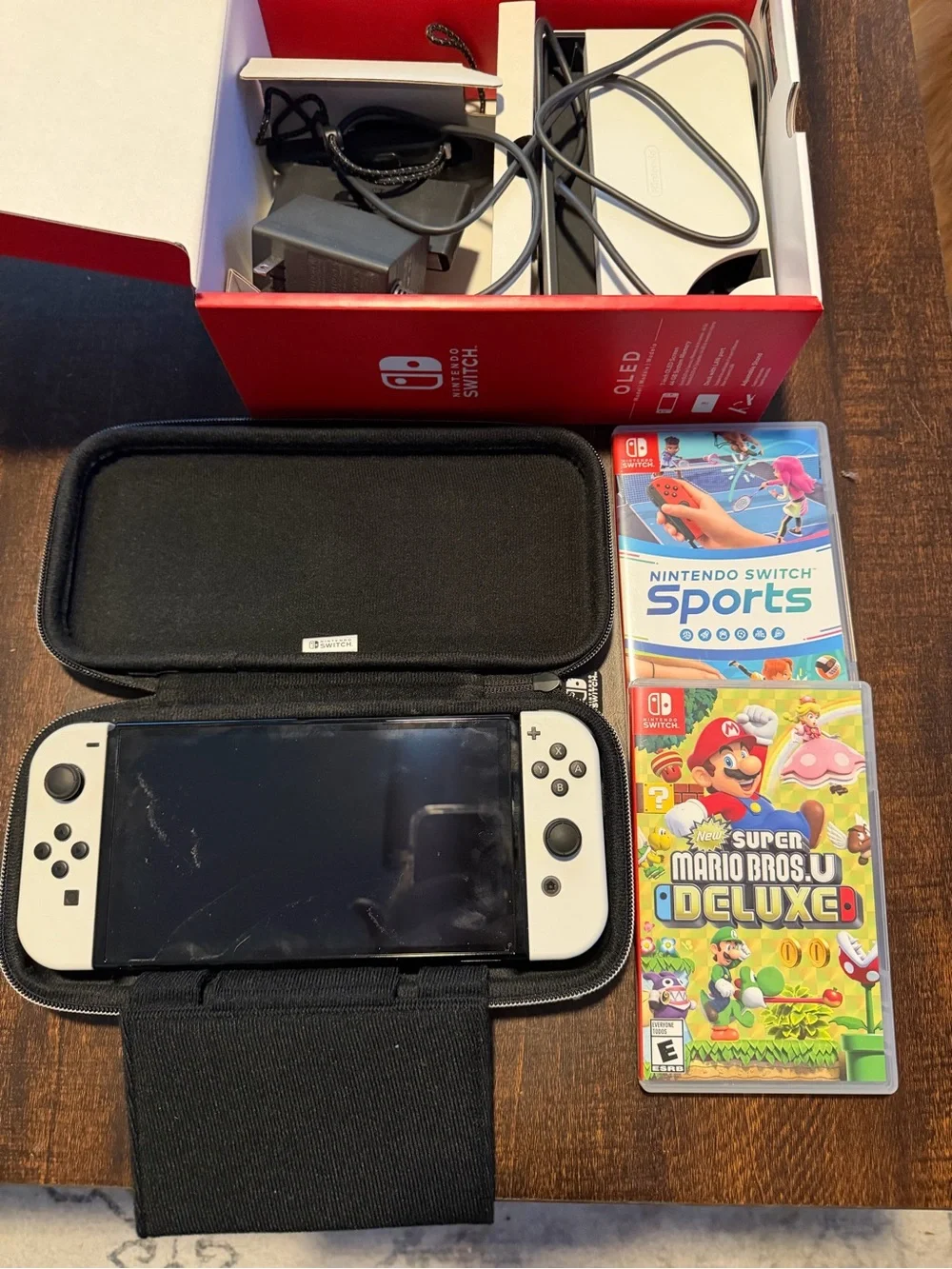 Nintendo Switch OLED Console Bundle in White with Black Case and Two Games
